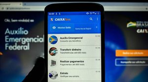 Como liberar a conta do Auxílio Emergencial bloqueada no aplicativo Caixa Tema