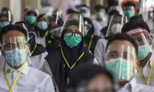 Número total de casos de Covid-19 no mundo registra recorde em uma semana