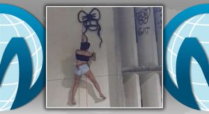 Jovens picham muro de prédio pendurados por corda no Centro de Fortaleza