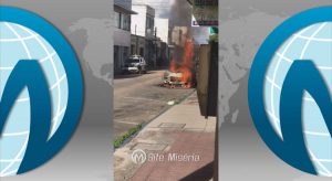 Veja carro incendiando no centro de Juazeiro e o fogo ainda atingiu fachada de loja