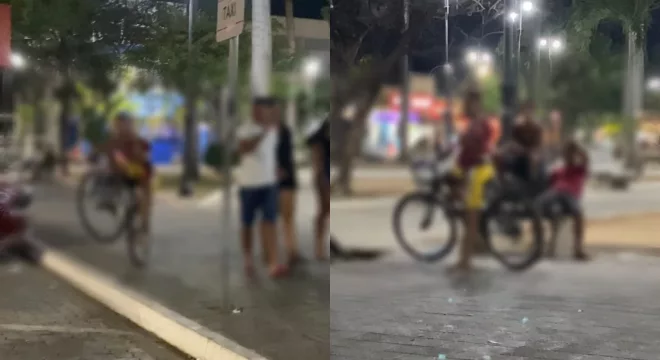 Garotos flagrados realizando manobras com bicicletas na Praça Padre Cícero em Juazeiro do Norte.