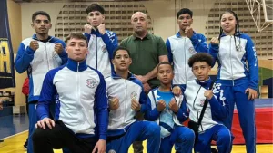 Atletas caririenses no no 35º Campeonato Brasileiro de Kung Fu, realizado no Ginásio da Universidade Católica de Brasília em Brasília (DF).