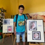 Caleb Oliveira, ao lado dos seus registros fotográficos de corpos celestes, no Ceja do Crato.