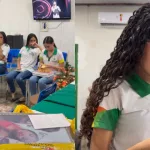 Emily aparece na sala emocionada com o presente que foi doado por um professor que adotou a ideia.
