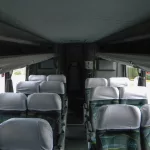 imagem interna de um onibus rodoviário. “Itapemirim bus interior” por Timon91, CC BY-NC-SA 2.0